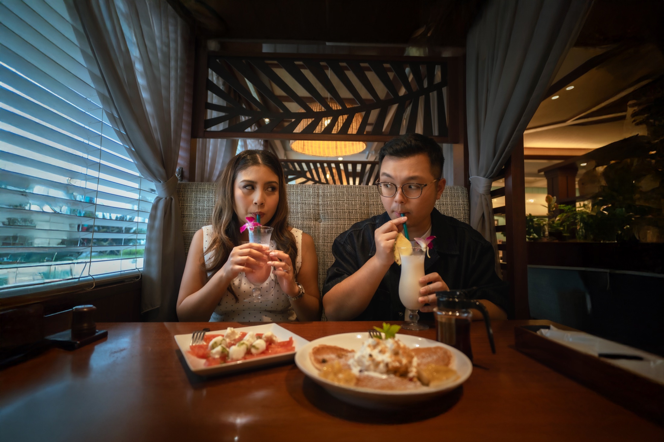 Declann and Afrina enjoying drinks together